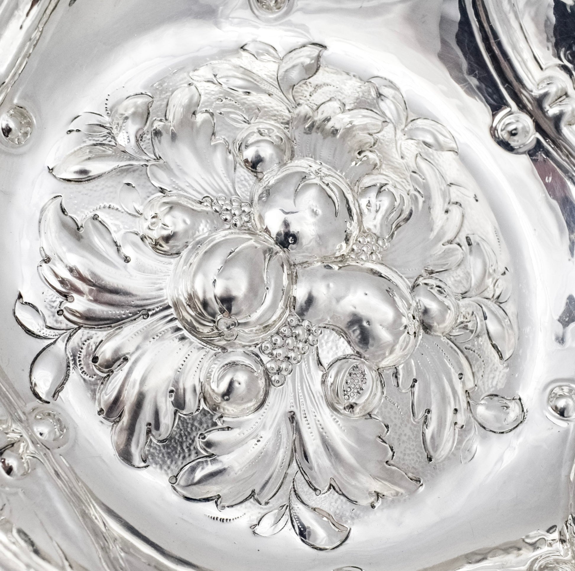 Georgian sterling silver lobed embossed fruit bowl with flying dog handles