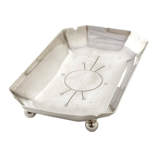 Modernist 1940's sterling silver vide poche snack/nut/candy bowl, oblong body on ball feet