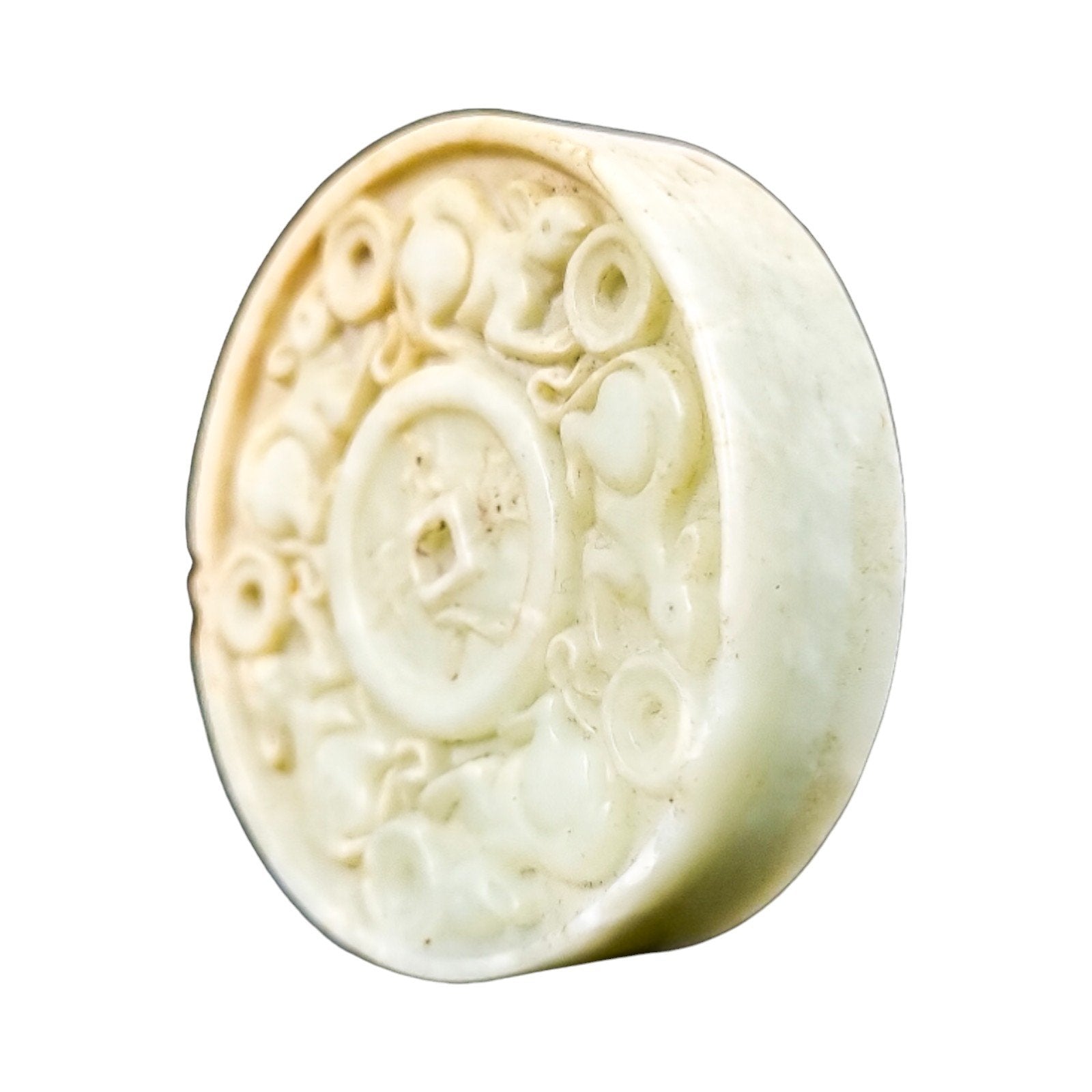 Chinese pale jade carved roundel depicting mice in pursuit