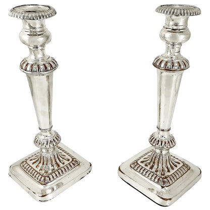 George III Old Sheffield plate pair of large candlesticks on square bases
