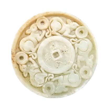 Chinese pale jade carved roundel depicting mice in pursuit