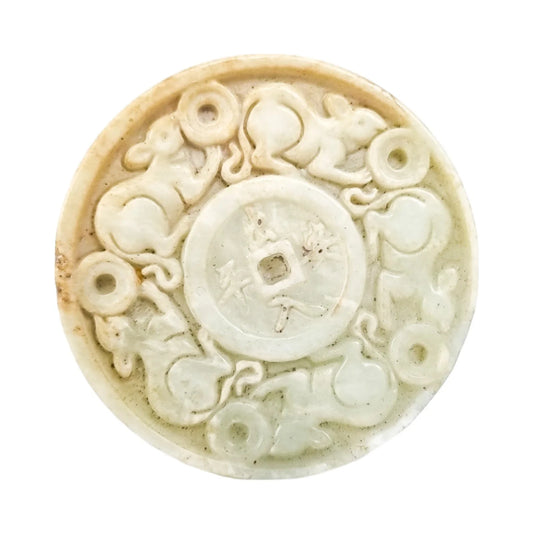 Chinese pale jade carved roundel depicting mice in pursuit