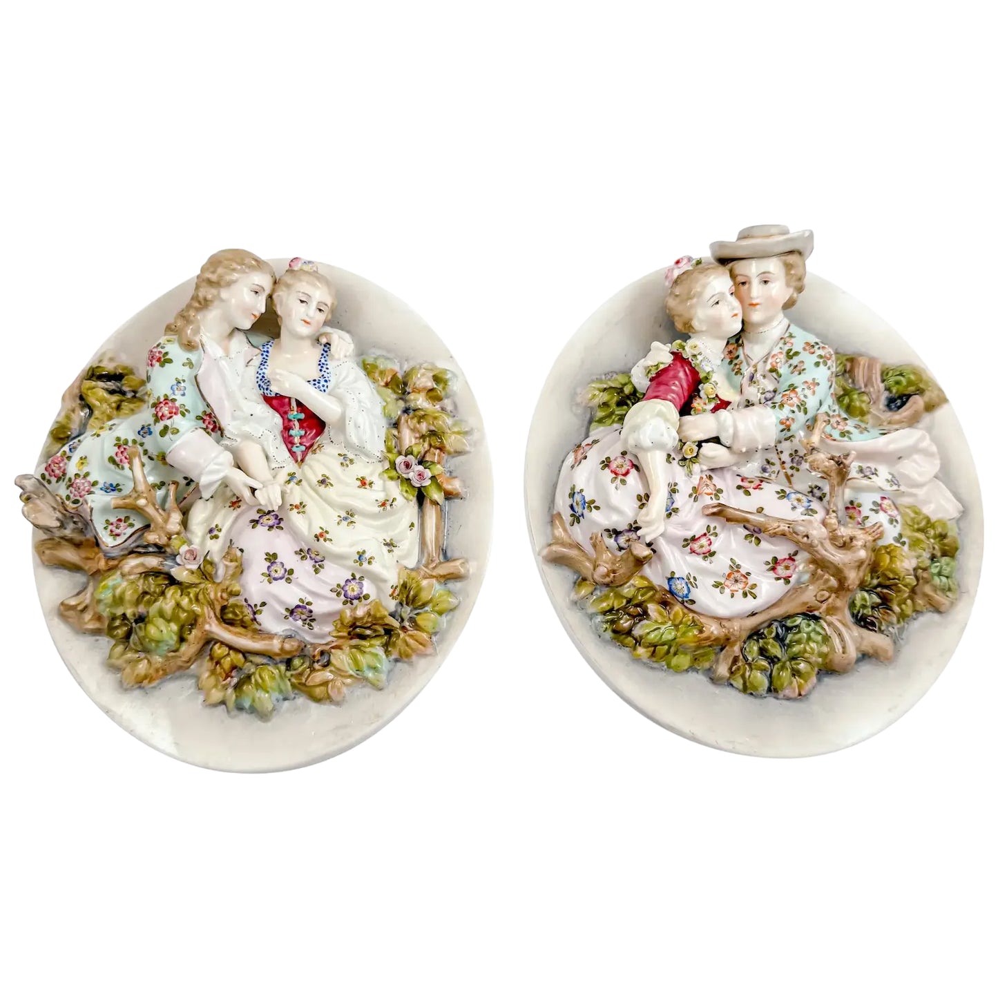 Pair early 19th Century porcelain Meissen style continental wall plaques, romantic scenes with lovers
