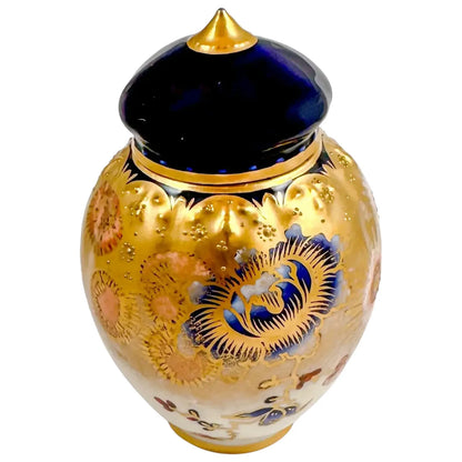 Victorian Royal Crown Derby lidded pot gilded and hand-painted with Imari flowers