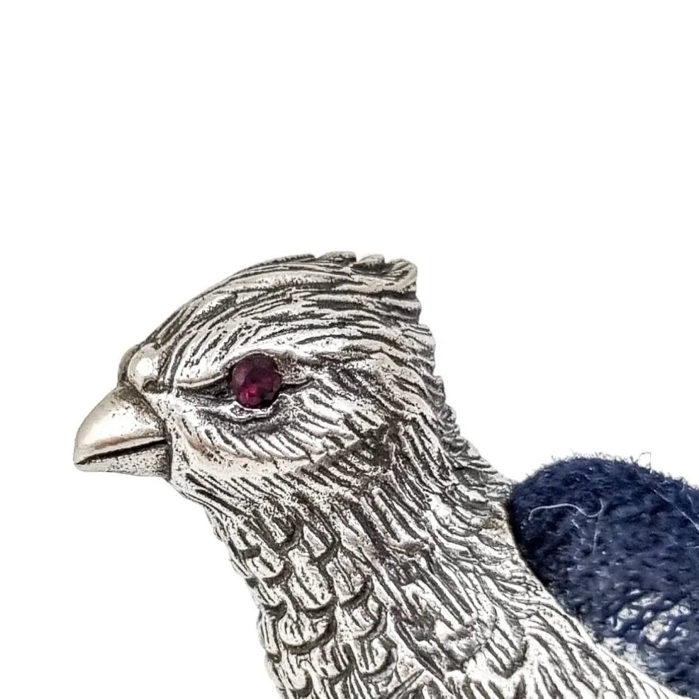 Edwardian style sterling silver bird pheasant pin cushion with ruby red eyes