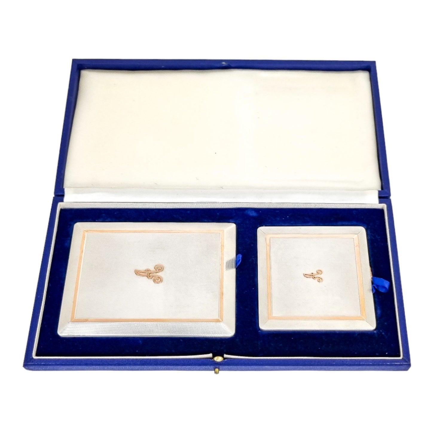 Silver matching cigarette case and powder compact with 9ct rose gold bands and letter "A"
