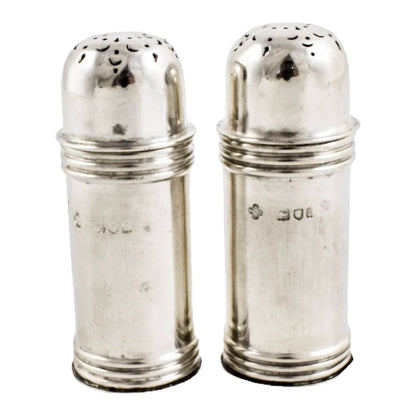 Pair of Victorian sterling silver pepper salt shakers with ribbed girdles