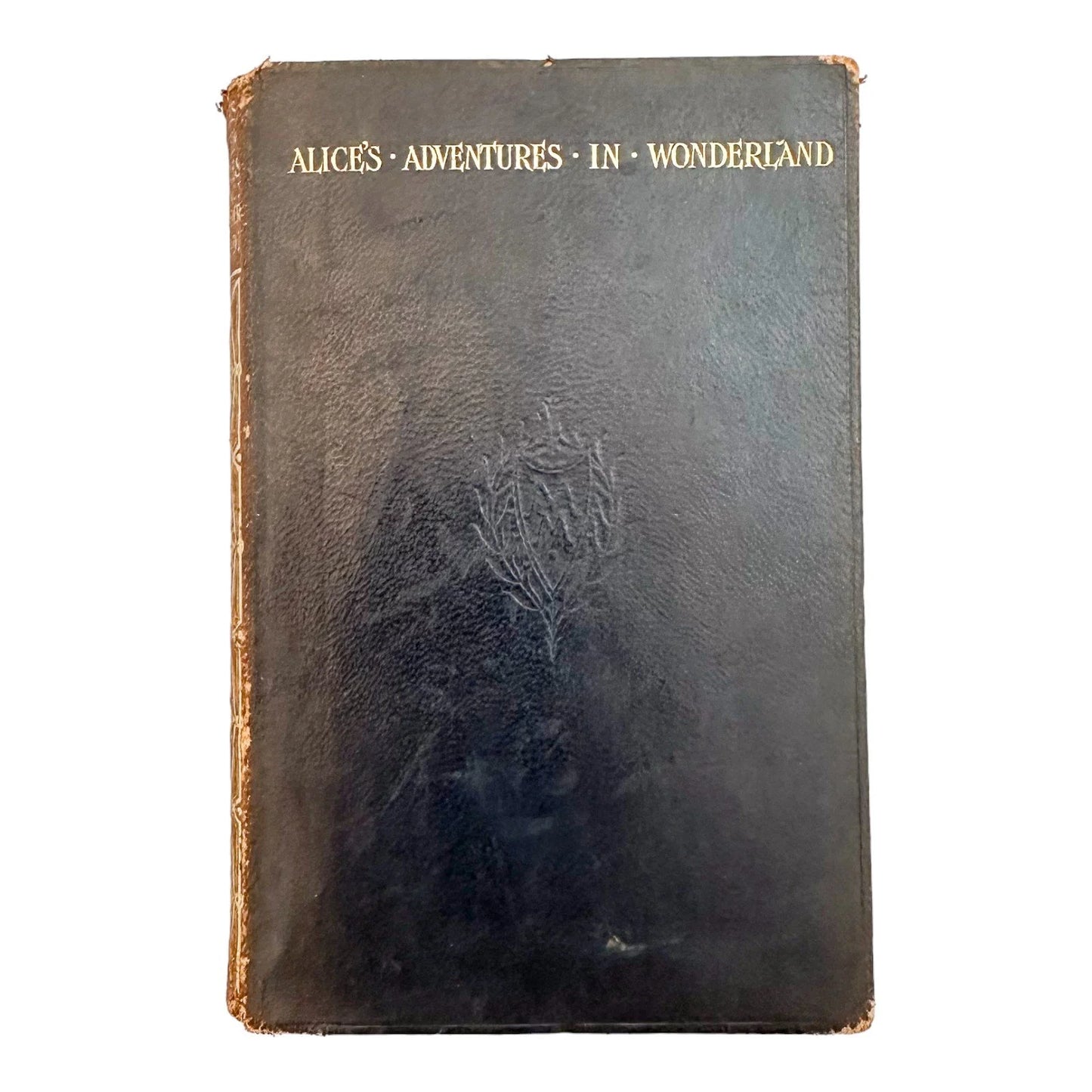 Illustrated leather bound first edition thus of "Alice's Adventures in Wonderland"