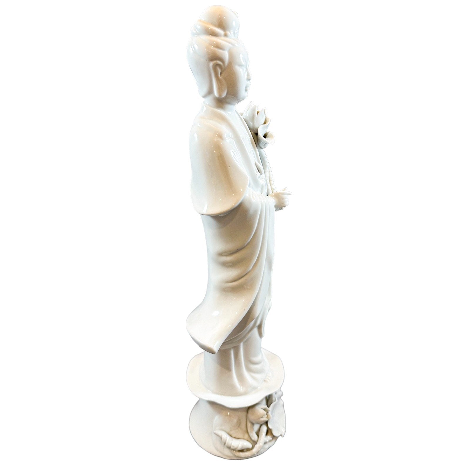 Blanc de Chine porcelain figurine of "Quan Yin on Lotus Blossom"
