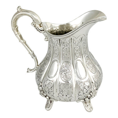 1860’s silverplate 4 piece tea and coffee set with nut finials and embossed flowers