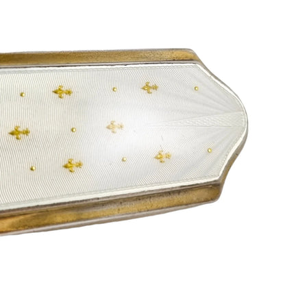Garrard & Co gilded silver white guilloché enamel clothes brush with gold fleur-de-lis