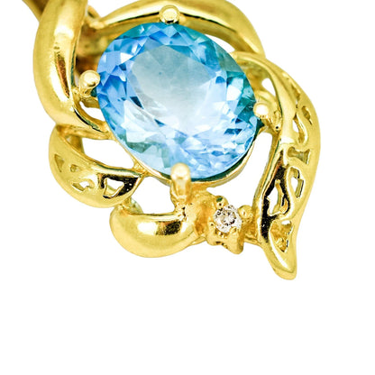 Vintage 14ct yellow gold blue topaz & diamond openwork scrolling pendant