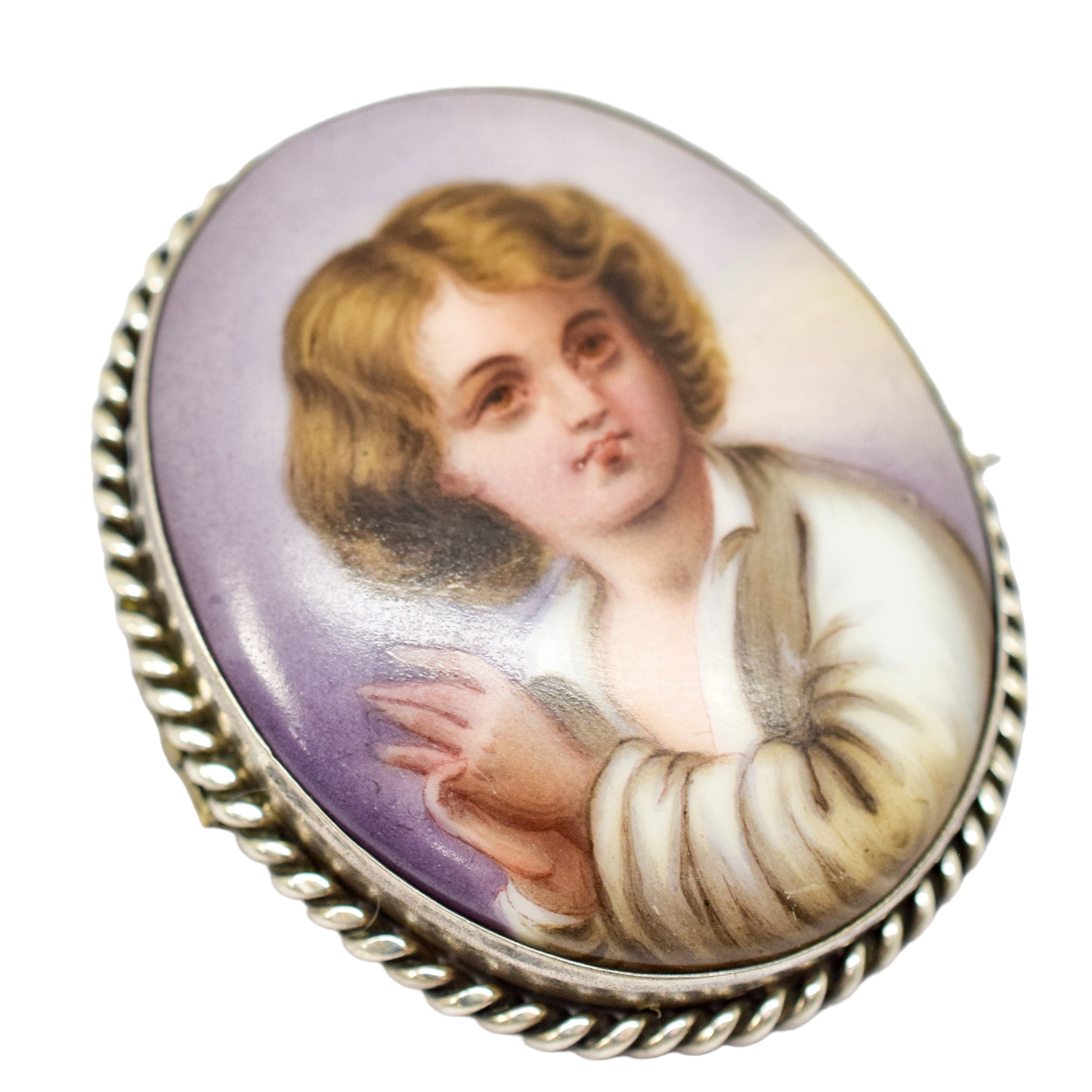 Victorian hand-painted porcelain portrait of a boy brooch in twisted rope silver frame