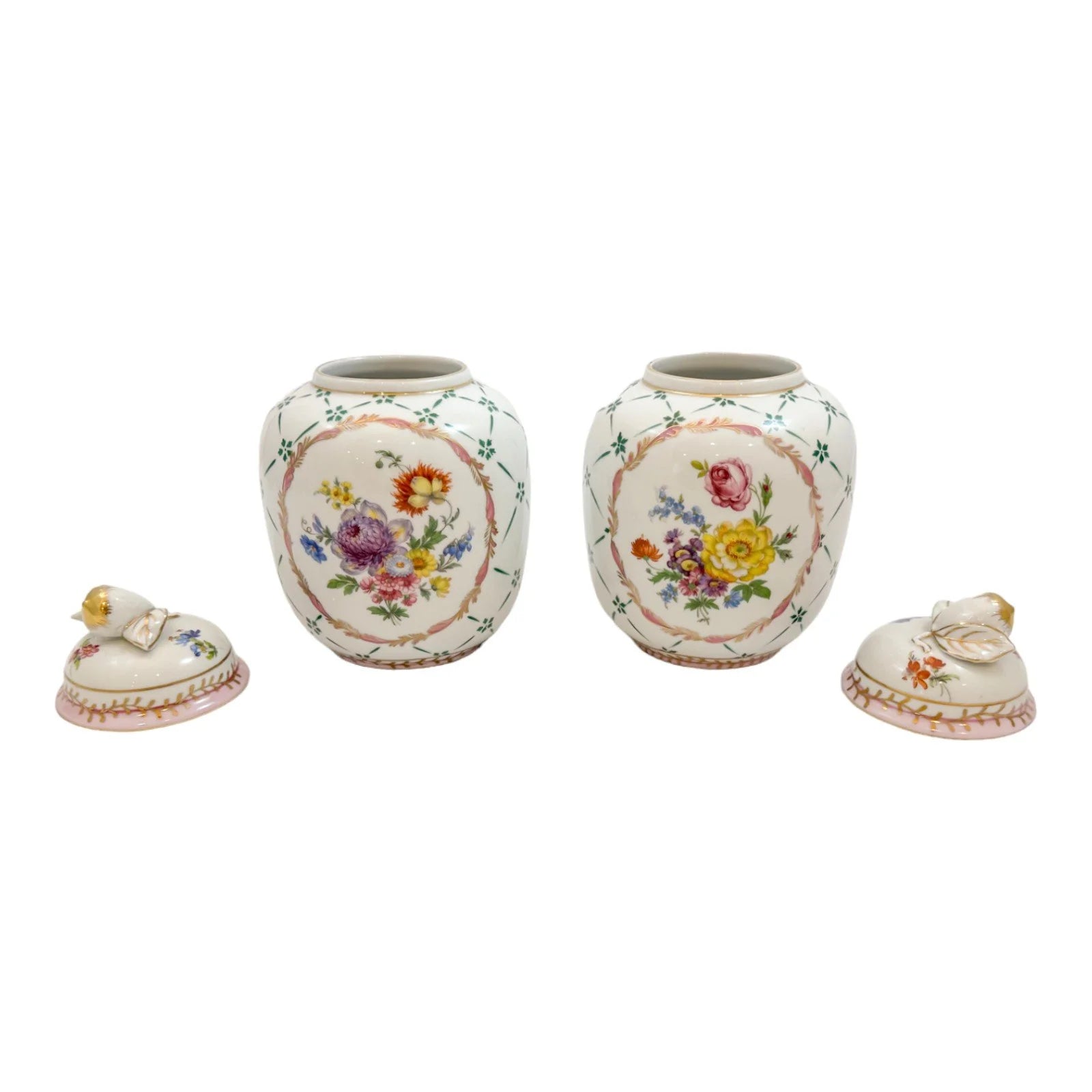 Pair of Royal Europe porcelain ginger jars with moulded lids and hand-painted with flowers