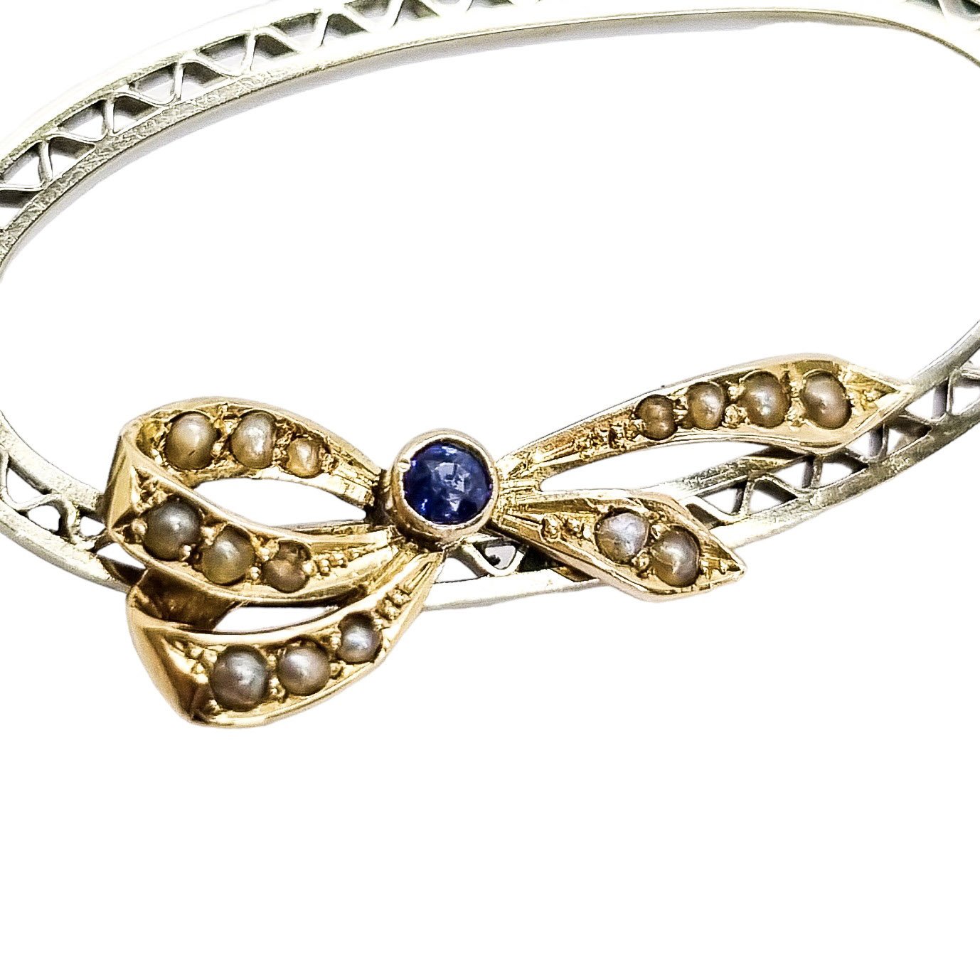 Antique 9ct gold oval openwork brooch with sapphire and seed pearl bow