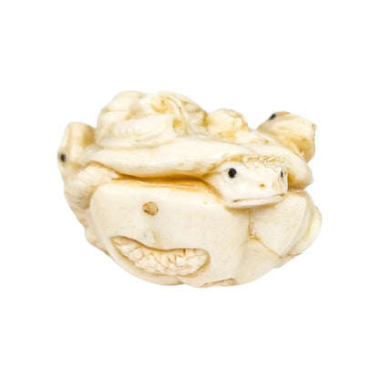 Meiji period Japanese bone signed okimono / netsuke, two toads and snake on pumpkin