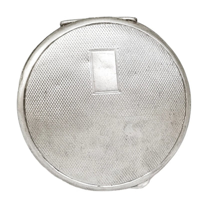 Art Deco sterling silver engine-turned powder compact case, vacant cartouche