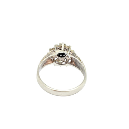 Sterling silver sapphire flower halo cluster ring in Brutalist style, size P