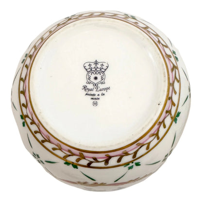 Pair of Royal Europe porcelain ginger jars with moulded lids and hand-painted with flowers