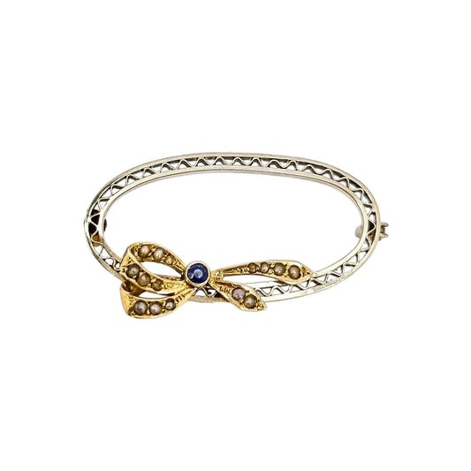 Antique 9ct gold oval openwork brooch with sapphire and seed pearl bow