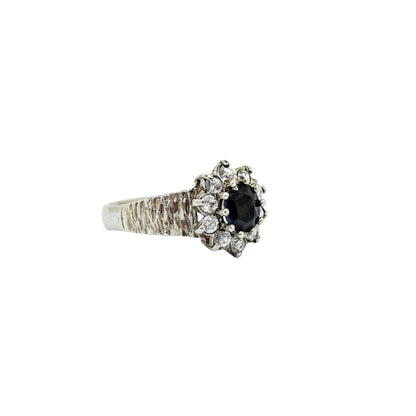 Sterling silver sapphire flower halo cluster ring in Brutalist style, size P