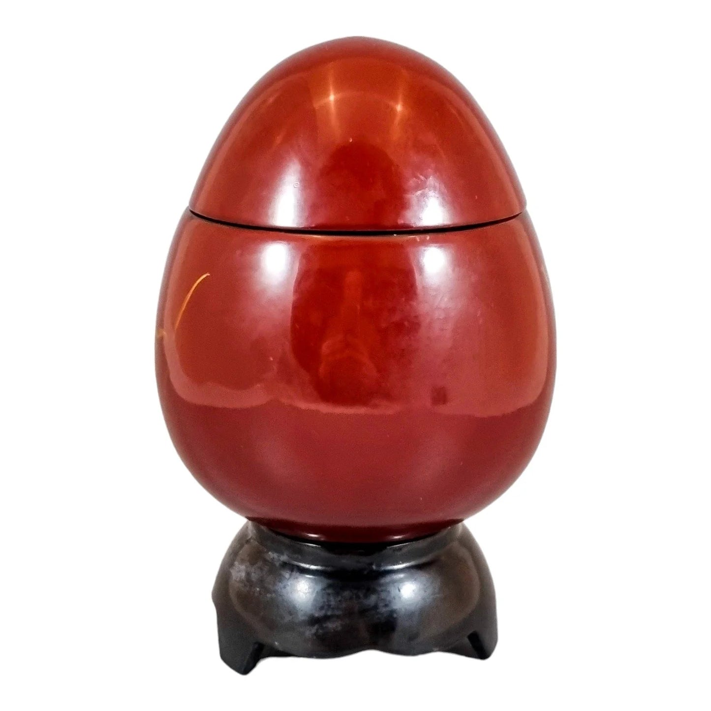 Egg-shaped large red lacquerware box on stand, gilded and painted with angelfish