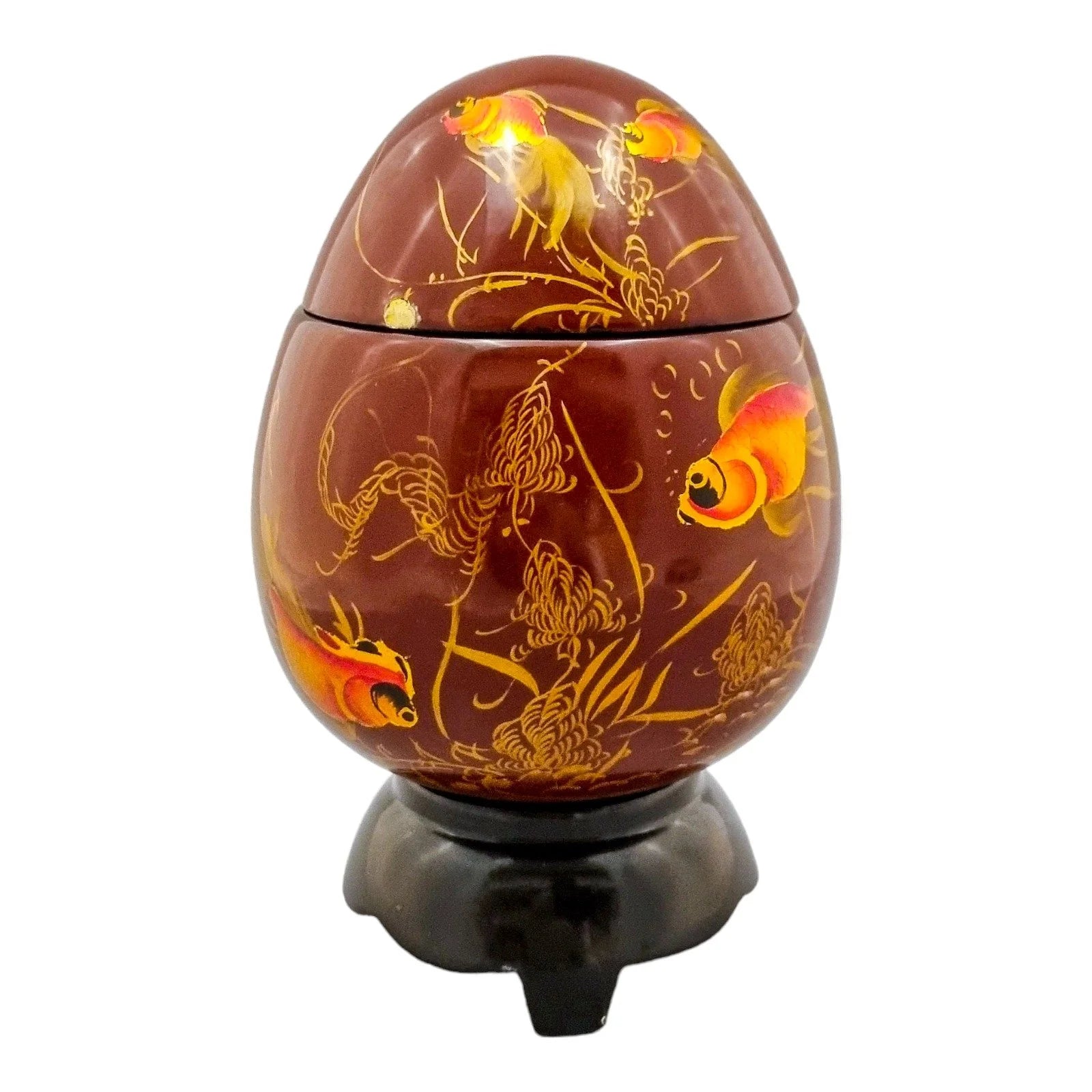 Egg-shaped large red lacquerware box on stand, gilded and painted with angelfish