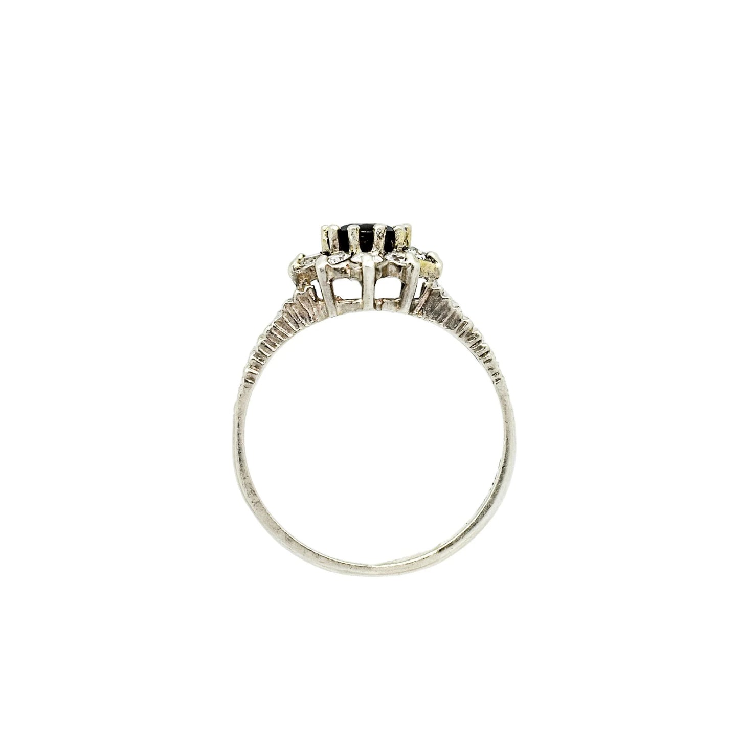 Sterling silver sapphire flower halo cluster ring in Brutalist style, size P