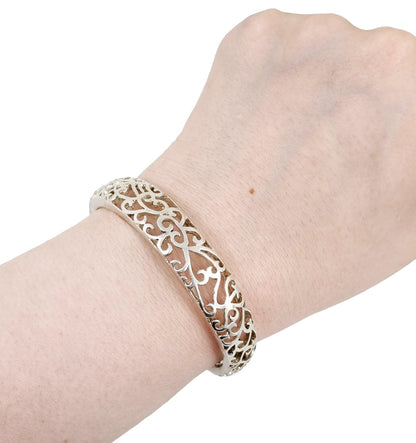 Vintage sterling silver cuff bracelet, intricate pierced scrolling design, USA, c. 1970s