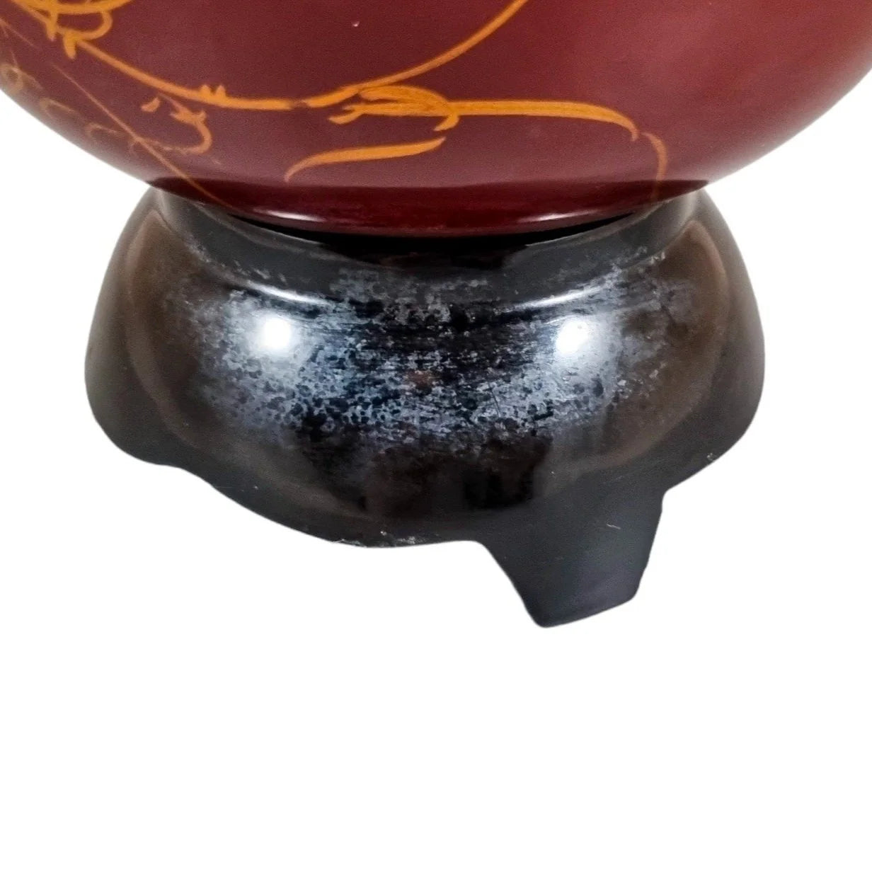 Egg-shaped large red lacquerware box on stand, gilded and painted with angelfish