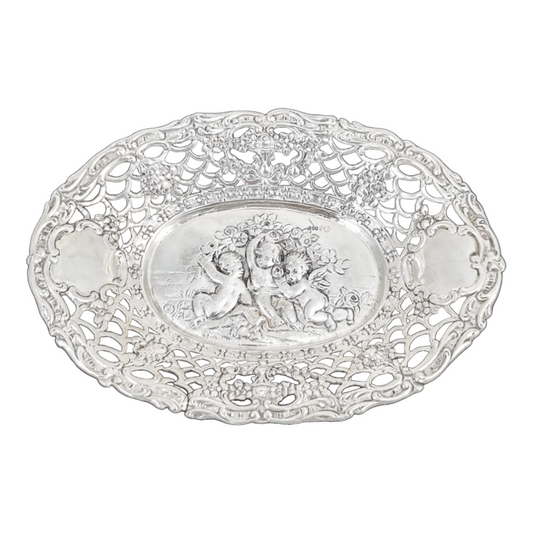 German silver pierced bonbon trinket dish with repousse cherubs and floral garlands