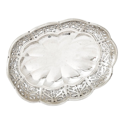 Art Nouveau sterling silver oval bonbon basket snack bowl on cast feet, pierced with scrolls