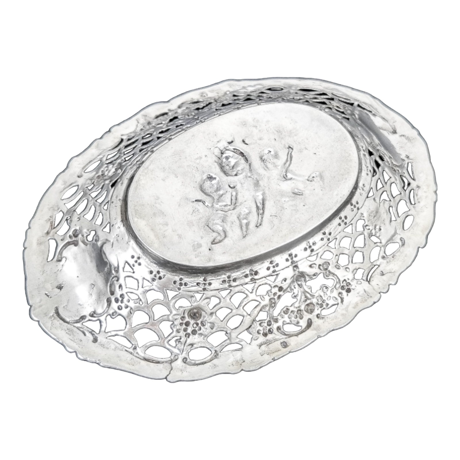 German silver pierced bonbon trinket dish with repousse cherubs and floral garlands