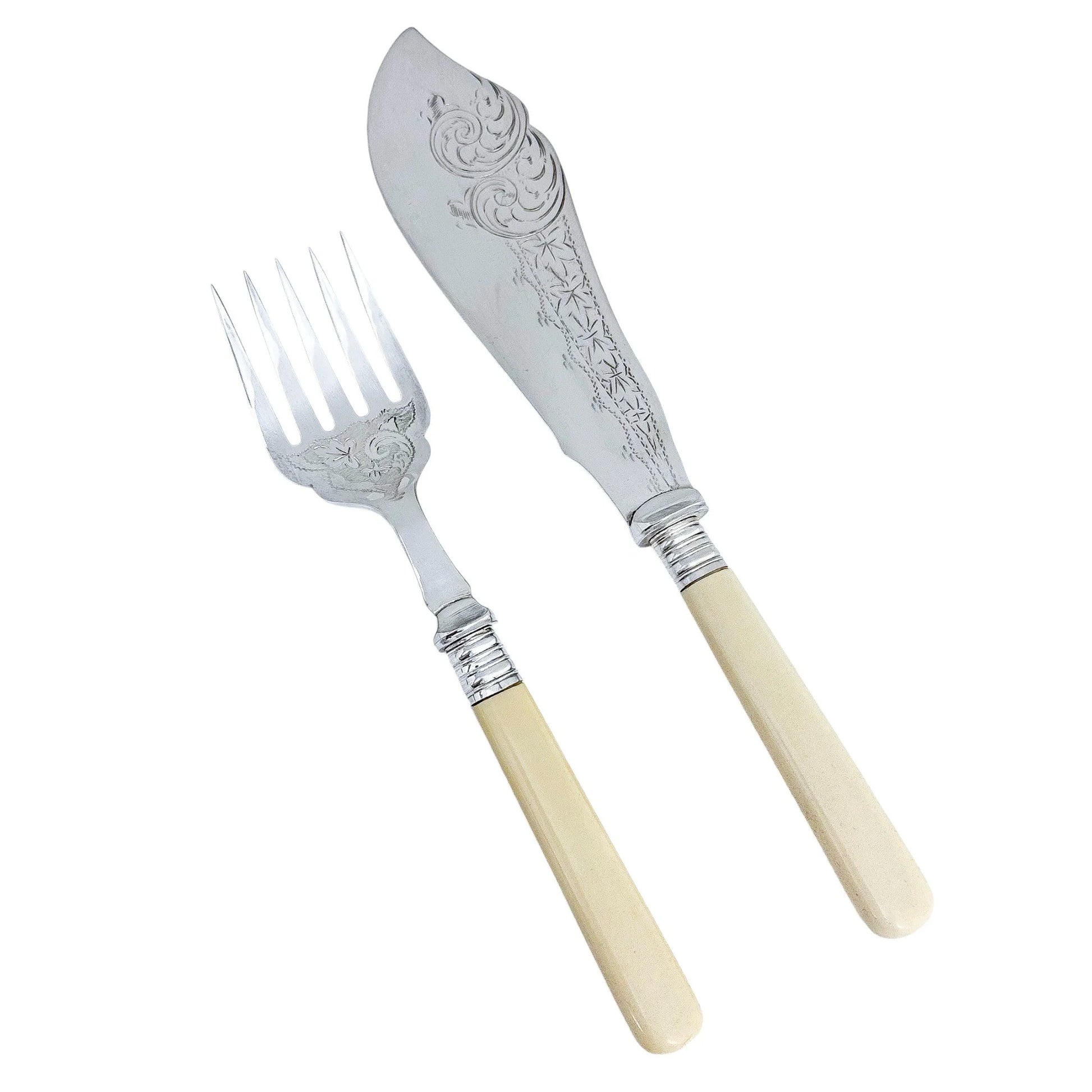 Victorian fish servers engraved with oak leaves, foliage and scrolls
