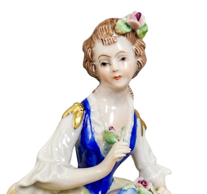 Sitzendorf porcelain figurine young girl with flower hat on tree stump