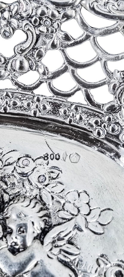 German silver pierced bonbon trinket dish with repousse cherubs and floral garlands
