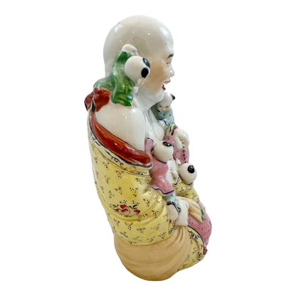 Vintage Chinese porcelain laughing Buddha figurine with children, a symbol of fertility
