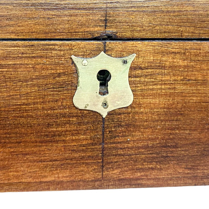 Walnut Victorian trinket storage box with inset brass carry handle and key escutcheon