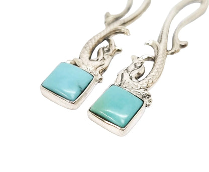 Sterling silver sea serpent dolphin dangle earrings with turquoise
