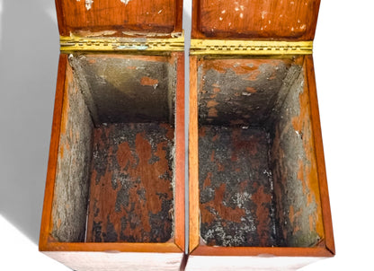 Regency mahogany twin tea caddy, original canisters
