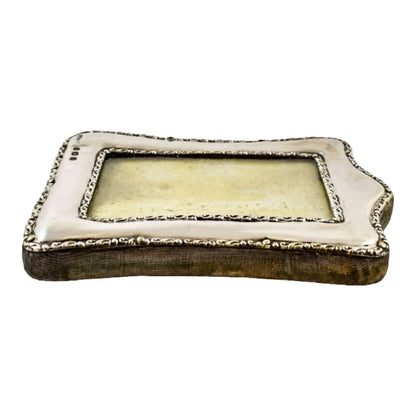 Edwardian sterling silver easel photo frame trimmed with scrolls
