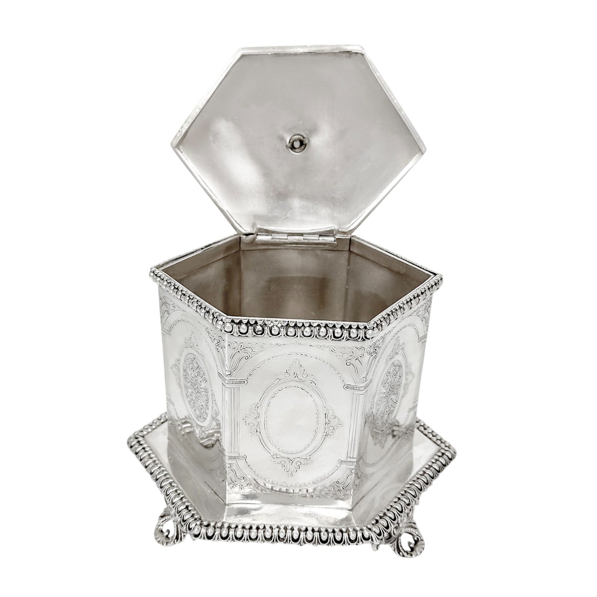 Victorian Neoclassical 6-sided silver-plated biscuit barrel on cast feet with egg-and-dart trim