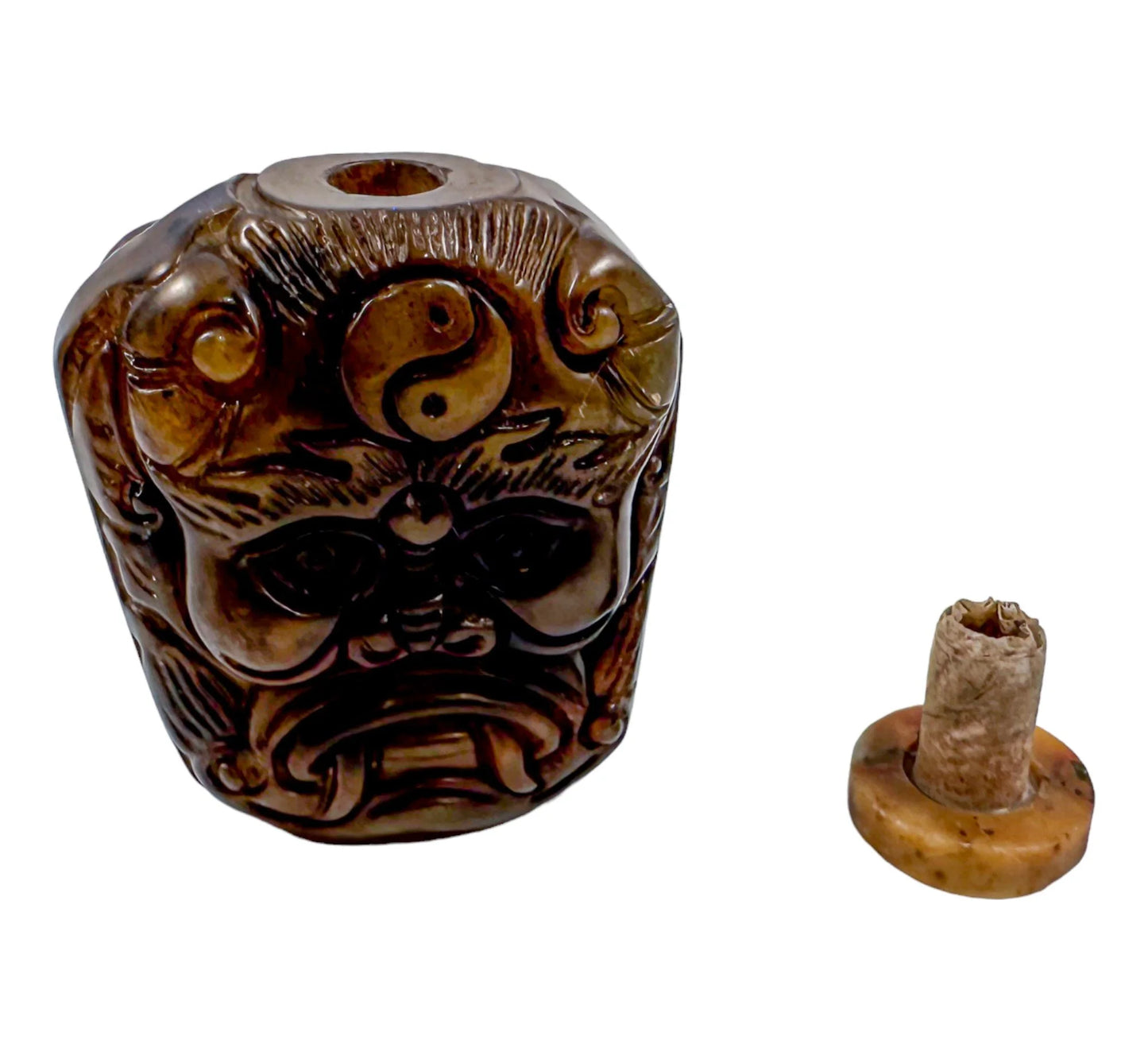 Qing Dynasty jade snuff bottle with demon mask and Yin/Yang symbol