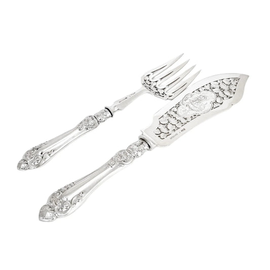 Cased Victorian sterling silver fish serving set with putto, lilies and dolphins, 1858