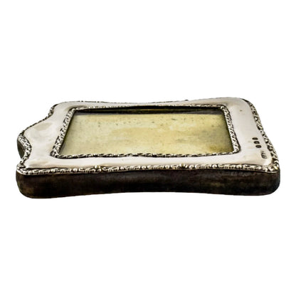 Edwardian sterling silver easel photo frame trimmed with scrolls