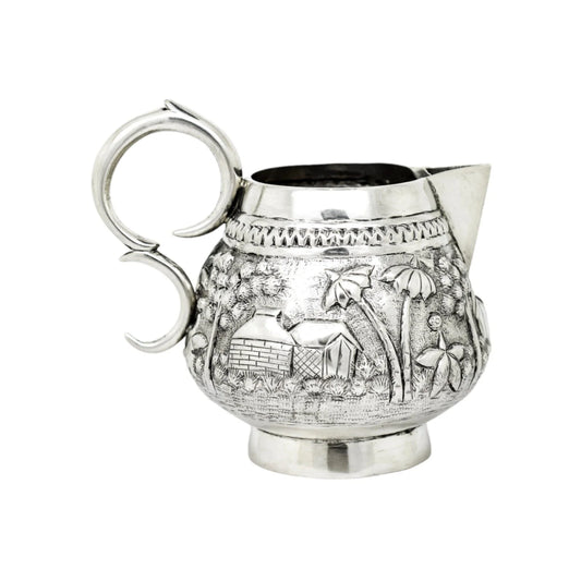 Colonial Raj Calcutta silver milk jug / creamer embossed with village scenes