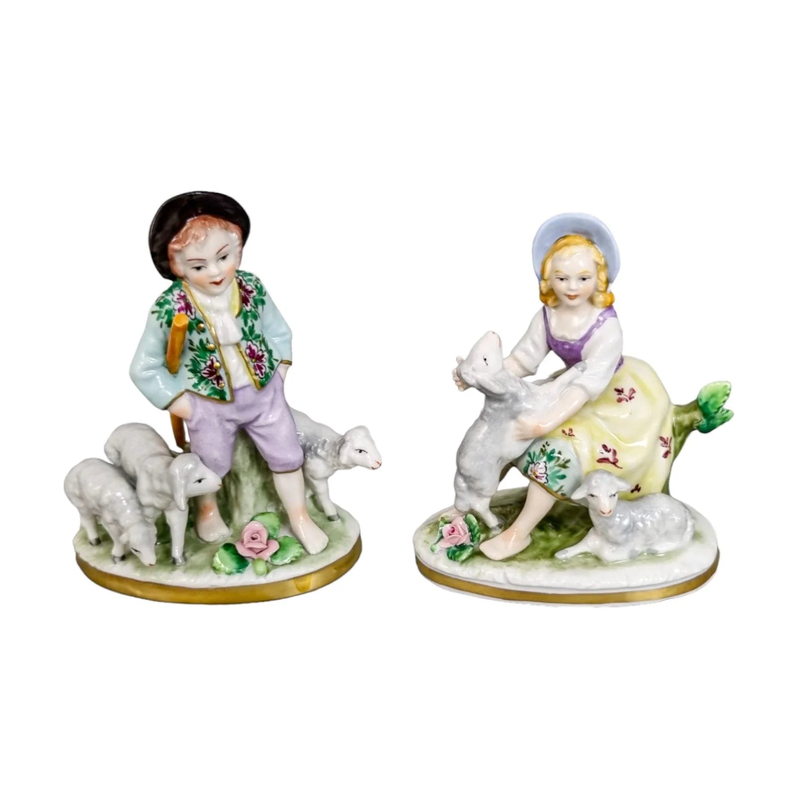 Miniature Sitzendorf porcelain boy and girl shepherds with sheep figurines