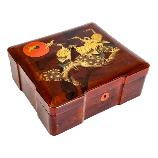 Meiji era Japanese large red lacquerware box maki-e gilded with cranes / storks