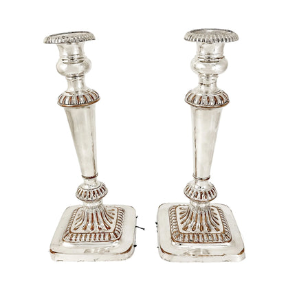 George III Old Sheffield plate pair of large candlesticks on square bases