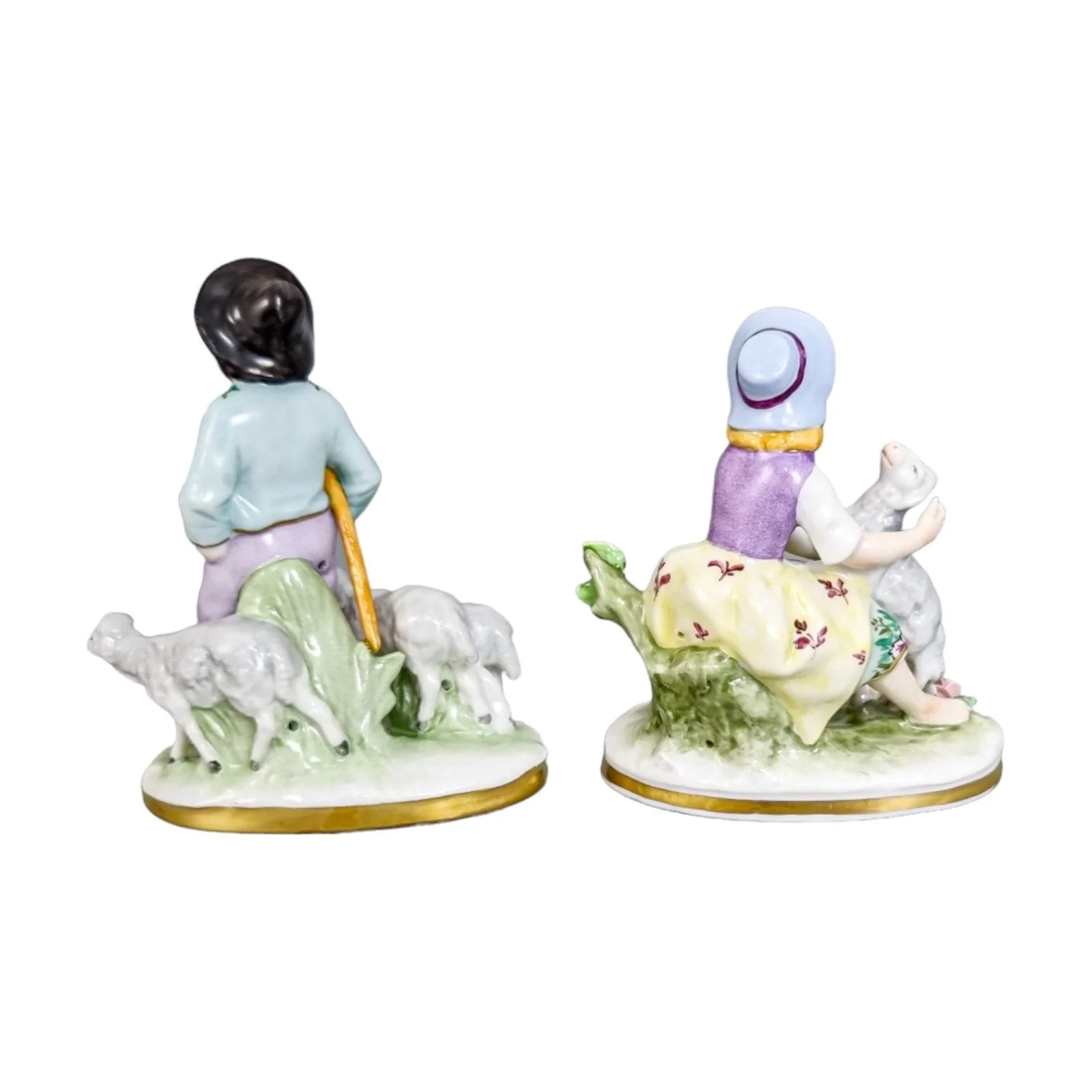 Miniature Sitzendorf porcelain boy and girl shepherds with sheep figurines